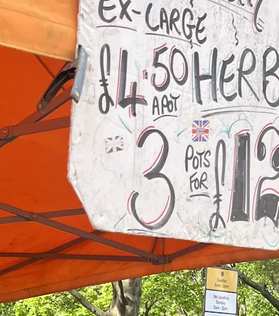 Herb prices under orange canopy